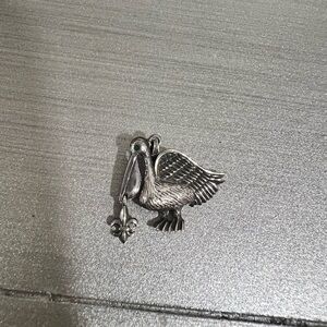 Silver Pelican with Fleur De Lis pendant